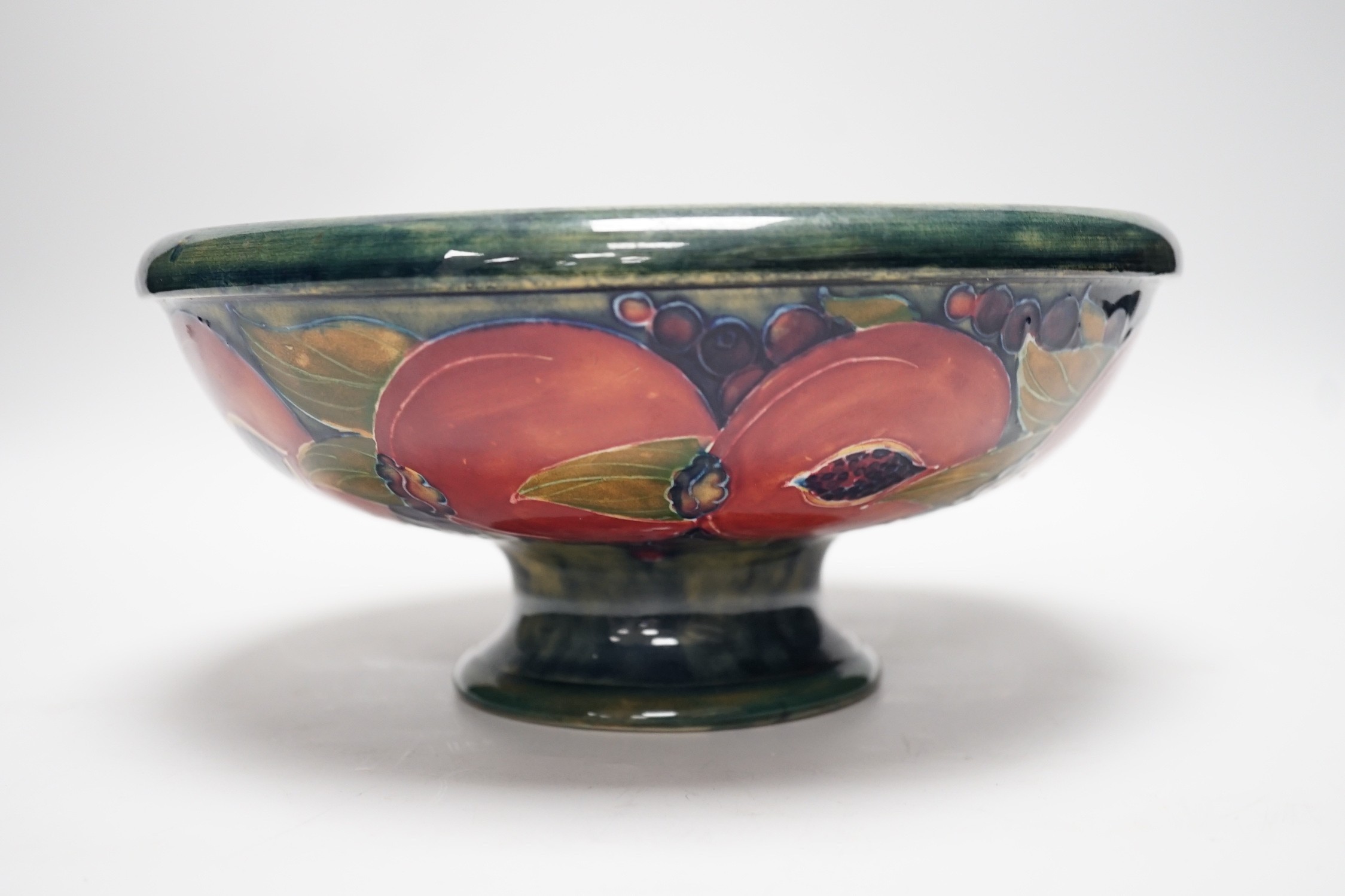 A Moorcroft Pomegranate pedestal bowl, 1920s, 23.5cm diameter